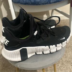 Women’s black Nike Metcons